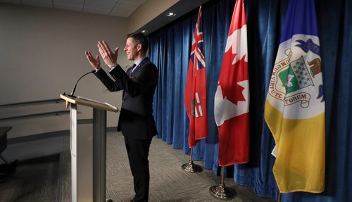 RUTH BONNEVILLE / WINNIPEG FREE PRESS

Local - City Hall budget.  
Winnipeg  mayor, Brian Bowman, smiles and jokes around just prior to the  press conference at city hall after council voted to pass  the 2019 budget by an 11-5 vote, Tuesday.  


March 20,, 2019
