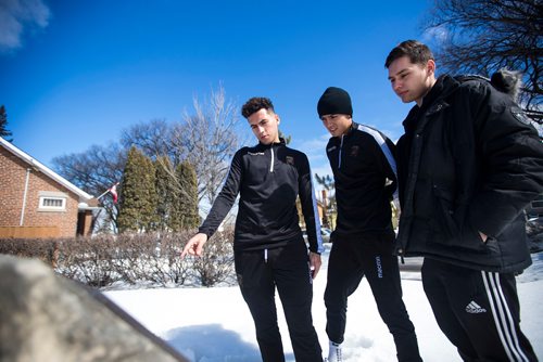 MIKAELA MACKENZIE / WINNIPEG FREE PRESS
Valour FC players Nicolas Galvis (left), Diego Gutierrez, and Kyle Andrade visit the Valour Road Commemorative Plaza to learn about the inspiration and naming of Valour FC in Winnipeg on Wednesday, March 20, 2019. 
Winnipeg Free Press 2019.