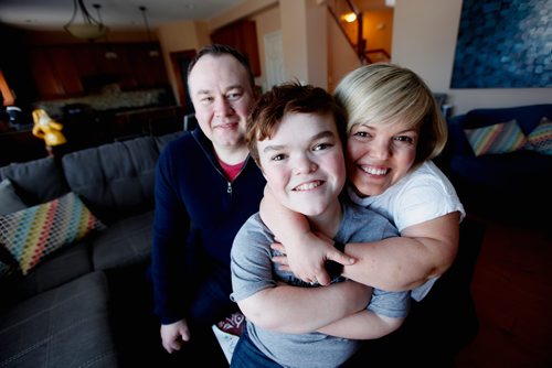 PHIL HOSSACK / WINNIPEG FREE PRESS - Samantha Rayburn-Trubyk, poses with her husband Ryan Trubyk and son Yale, she's the president of Little People of Manitoba who has been leading a successful campaign to have sports organizations stop using the term midget as an age classification in their programs. Doug Spiers story.  - March 20, 2019.