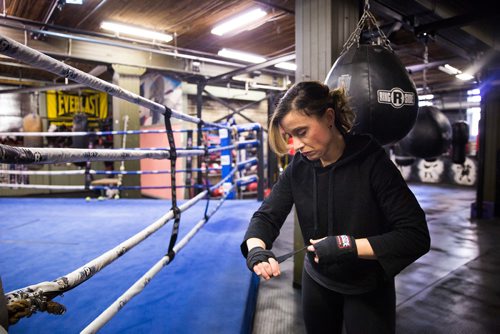 MIKAELA MACKENZIE / WINNIPEG FREE PRESS
Sabrina Carnevale, new health columnist, gets ready at the at Pan Am Boxing Club for a noon class in Winnipeg on Thursday, March 21, 2019. 
Winnipeg Free Press 2019.