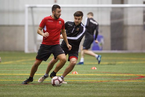 MIKE DEAL / WINNIPEG FREE PRESS
Valour FC Dylan Carreiro (left) and Michael Petrasso (right) during training camp at the Winnipeg Subway Soccer South complex Thursday morning.
190321 - Thursday, March 21, 2019.