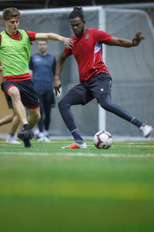 MIKE DEAL / WINNIPEG FREE PRESS
Valour FC Skylar Thomas (right) and Tyler Attardo (left) during training camp at the Winnipeg Subway Soccer South complex Thursday morning.
190321 - Thursday, March 21, 2019.