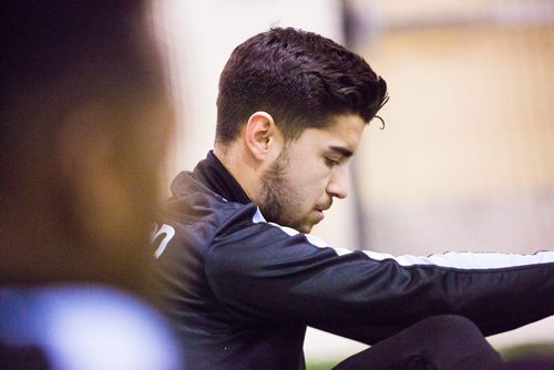 MIKAELA MACKENZIE / WINNIPEG FREE PRESS
Dylan Sacramento stretches at Valour FC practice at the Subway South Soccer Complex in Winnipeg on Friday, March 22, 2019. 
Winnipeg Free Press 2019.