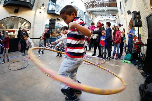 JOHN WOODS / WINNIPEG FREE PRESS
Juan Mosquero tries out a hula hoop during the Festival of Fools at the Forks in Winnipeg Sunday, March 24, 2019.