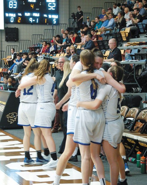 Canstar Community News Oak Park Raiders players hug as time runs out in the MHSAA AAAA varsity girls basketball final on Mon., March 18, 2019 at Investors Group Athletic Centre at the University of Manitoba. Oak Park defeated Sturgeon Heights 83-52 to win its third title in a row.