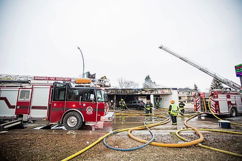 MIKAELA MACKENZIE / WINNIPEG FREE PRESS
Fire crews work to put out hotspots at a fire at the Goodwill store at 1540 Pembina in Winnipeg on Tuesday, March 26, 2019. 
Winnipeg Free Press 2019.