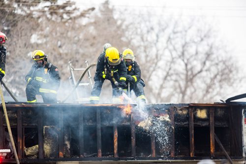 MIKAELA MACKENZIE / WINNIPEG FREE PRESS
Fire crews work to put out hotspots at a fire at the Goodwill store at 1540 Pembina in Winnipeg on Tuesday, March 26, 2019. 
Winnipeg Free Press 2019.