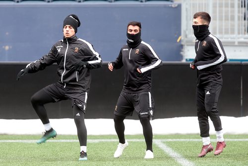 PHIL HOSSACK / WINNIPEG FREE PRESS  - Valour FC #14 Nicolás Galvis (left) works out with the team Wednesday at Investors Group Field. Taylor Allen story. - March27, 2019.