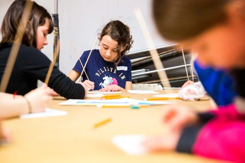 MIKAELA MACKENZIE / WINNIPEG FREE PRESS
Violet Enns, eight, pokes her drawing into styrofoam to to make ink prints at ARTcamp at the Winnipeg Art Gallery in Winnipeg on Wednesday, March 27, 2019. 
Winnipeg Free Press 2019.