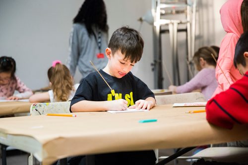 MIKAELA MACKENZIE / WINNIPEG FREE PRESS
Noah Zylberman-Reid, six, pokes his drawing into styrofoam to make ink prints at ARTcamp at the Winnipeg Art Gallery in Winnipeg on Wednesday, March 27, 2019. 
Winnipeg Free Press 2019.