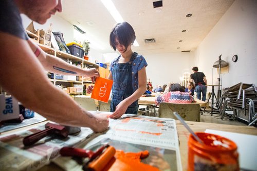 MIKAELA MACKENZIE / WINNIPEG FREE PRESS
Art instructor Michel St. Hilaire helps Greta Pancoe, eight, make ink prints at ARTcamp at the Winnipeg Art Gallery in Winnipeg on Wednesday, March 27, 2019. 
Winnipeg Free Press 2019.