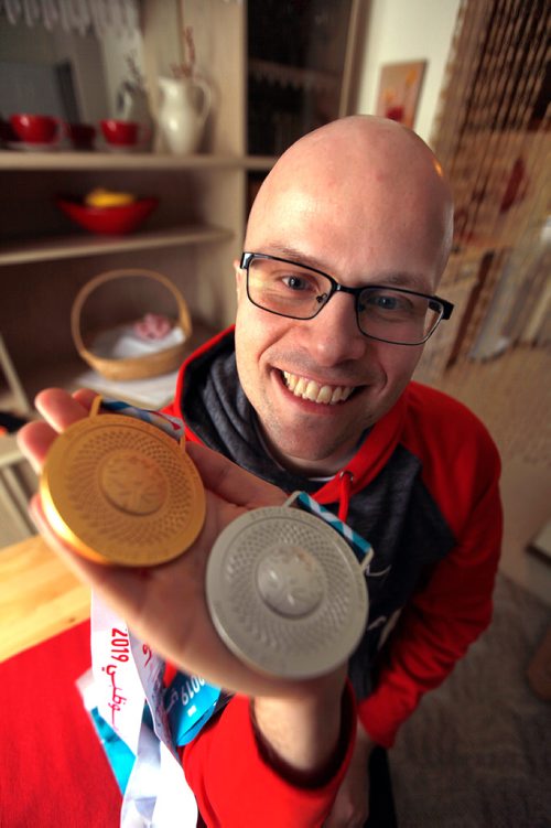 PHIL HOSSACK / WINNIPEG FREE PRESS  - Special Olympian bocce ball athlete Philip Bialk shows off his hardware Wednesday after returning from the United Arab Enmirates where 7000 athletes competed in Summer Games. See Alex Paul's story.  - March27, 2019.
