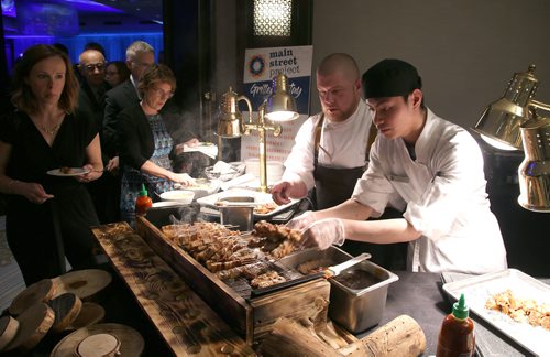 JASON HALSTEAD / WINNIPEG FREE PRESS

Fairmont Winnipeg executive chef Tim Palmer and staff work the charcola grill at a food station at Main Street Project's annual fundraising benefit dinner Bringin' it in from the Streets on March 16, 2019 at the Fairmont Winnipeg. (See Social Page)