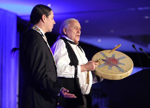 JASON HALSTEAD / WINNIPEG FREE PRESS

Winston Wuttunee (right) and MP for Winnipeg Centre Robert-Falcon Ouellette perform a prayer song at Main Street Project's annual fundraising benefit dinner Bringin' it in from the Streets on March 16, 2019 at the Fairmont Winnipeg. (See Social Page)