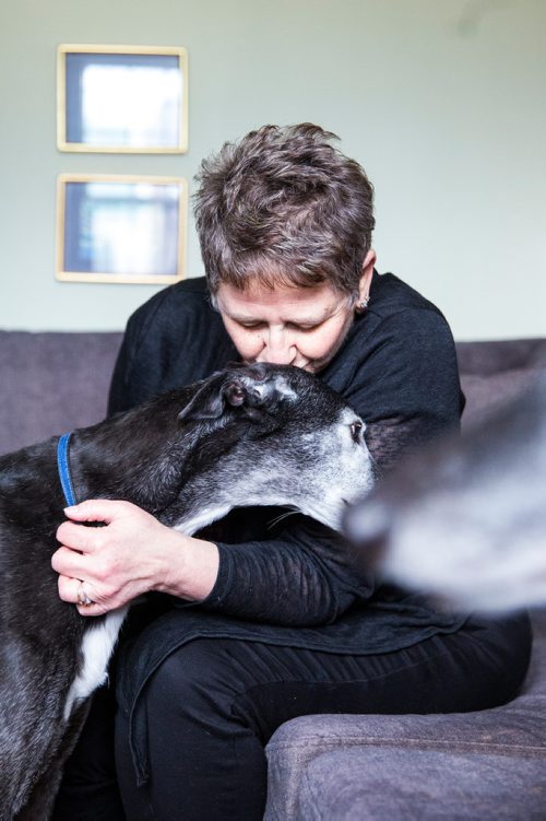 MIKAELA MACKENZIE / WINNIPEG FREE PRESS
Susan Lohse, vice president of Northern Sky Greyhounds, with her three dogs and a friend's greyhound in Winnipeg on Thursday, March 28, 2019.  For Declan Schroeder story.
Winnipeg Free Press 2019.