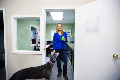 MIKAELA MACKENZIE / WINNIPEG FREE PRESS
Carrie Hasinoff, an owner of a Northern Sky dog, and her greyhound Stormy in her office at No-Spill Systems in Winnipeg on Friday, March 29, 2019.  For Declan Schroeder story.
Winnipeg Free Press 2019.