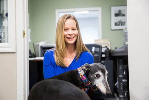 MIKAELA MACKENZIE / WINNIPEG FREE PRESS
Carrie Hasinoff, an owner of a Northern Sky dog, and her greyhound Stormy in her office at No-Spill Systems in Winnipeg on Friday, March 29, 2019.  For Declan Schroeder story.
Winnipeg Free Press 2019.