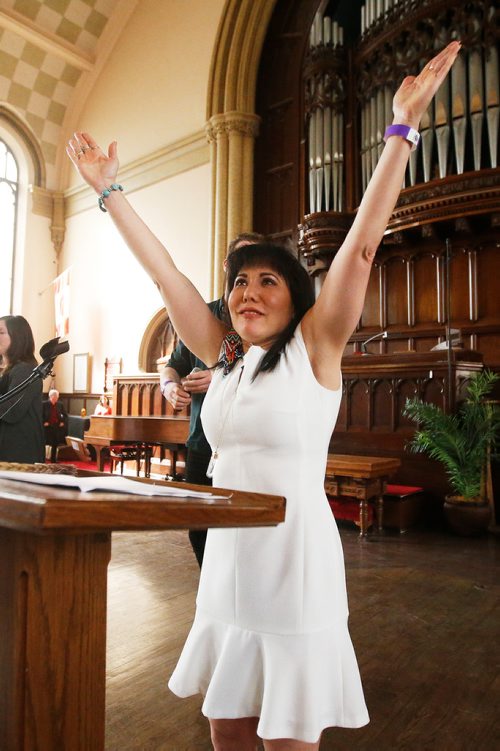 JOHN WOODS / WINNIPEG FREE PRESS
Candidate Leah Gazan gestures before her speech on the stage at the federal NDP Winnipeg candidate nomination meeting at Knox United Church in Winnipeg Sunday, March 31, 2019.