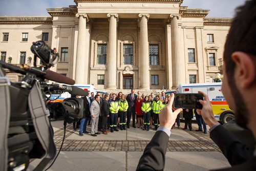 MIKE DEAL / WINNIPEG FREE PRESS
Premier Brian Pallister announced that the Manitoba government has reduced ambulance fees, effective immediately, to no more than $250 per ride, during a press conference held in the rotunda of the Manitoba Legislative building Monday morning. He also held a photo opportunity with many of his MLA's and a couple of ambulances and their EMS crew outside the building.
190401 - Monday, April 01, 2019.
