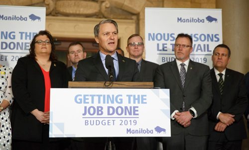 MIKE DEAL / WINNIPEG FREE PRESS
Health, Seniors and Active Living Minister Cameron Friesen talks after Premier Brian Pallister announced that the Manitoba government has reduced ambulance fees, effective immediately, to no more than $250 per ride, during a press conference held in the rotunda of the Manitoba Legislative building Monday morning. 
190401 - Monday, April 01, 2019.