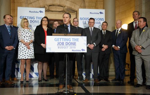 MIKE DEAL / WINNIPEG FREE PRESS
Health, Seniors and Active Living Minister Cameron Friesen talks after Premier Brian Pallister announced that the Manitoba government has reduced ambulance fees, effective immediately, to no more than $250 per ride, during a press conference held in the rotunda of the Manitoba Legislative building Monday morning. 
190401 - Monday, April 01, 2019.