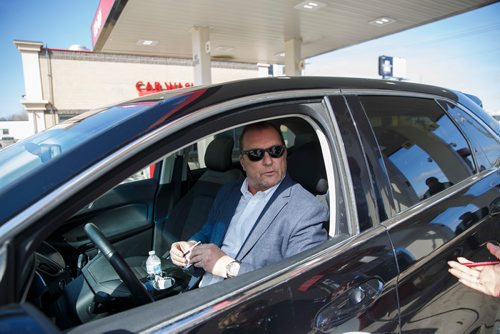 MIKE DEAL / WINNIPEG FREE PRESS
Paul Howes in his Ford Edge at the Co-Op gas station at Ellice and Wall.
Talking to people at gas bars about the carbon tax, but not simply about whether they like paying more taxes. Are they in favour of this if it makes a difference in fighting climate change?  
190401 - Monday, April 01, 2019.
