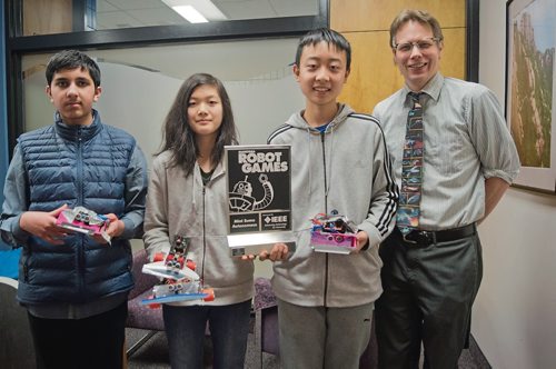 Canstar Community News March 20, 2019 - Jagrit Sharma (left), Hannah Tao, Richard Ding, and Jared Thorlakson are part of Acadia Junior High Schools robotics club. Ding won the championship title in the Mini Sumo Autonomous category at the Manitoba Robot Games on March 16. (DANIELLE DA SILVA/SOUWESTER/CANSTAR)