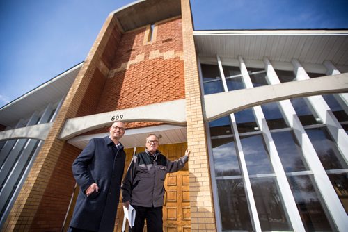 MIKAELA MACKENZIE / WINNIPEG FREE PRESS
Richard Frechette (left), administrator at Archdiocese of Saint Boniface and  Gordon Grey of Discovery Homes pose for a portrait by the former Notre-Dame-de-L-Assomption parish in Transcona, which is slated to become condos in Winnipeg on Tuesday, April 2, 2019.  For Brenda Suderman story.
Winnipeg Free Press 2019.