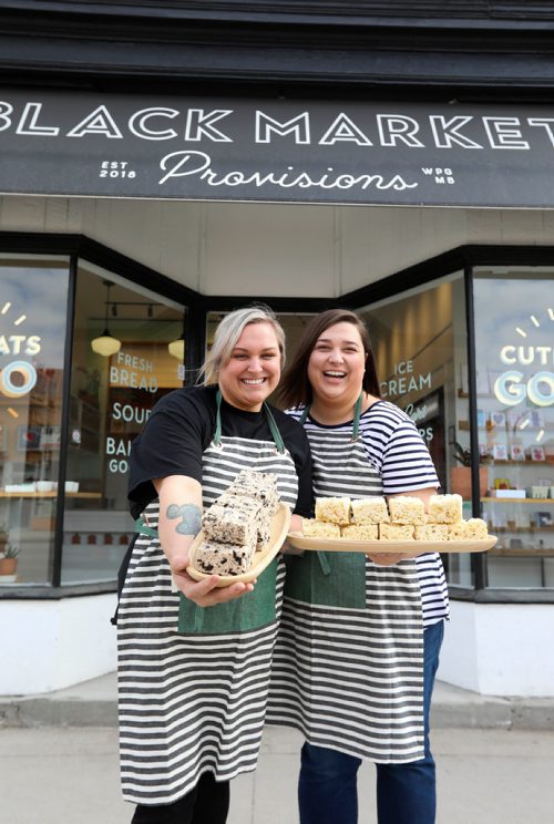RUTH BONNEVILLE / WINNIPEG FREE PRESS 

Intersection - Black Market Provisions
 
Where: Black Market Provisions, 550 Osborne St (Morley & Osborne, former home of Pollock's Hardware) 

Photos of shop owners Angela Farkas (blond)  and Alana Fiks holding their famous rice Krispie squares in store.  

What: This is for an Intersection piece on the newly-opened Black Market Provisions. Four years ago Angela & Alana founded Pop Cart - a frozen treat biz that marketed popsicles at farmer's markets & pop-up events all over the province. Last summer, they took over the space at 550 Osborne St and after months of renos, they opened their bit-of-everything store at 550 Osborne on March 21. 

See Dave Sanderson story. 

April 2, 2019
