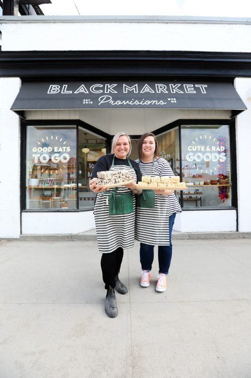 RUTH BONNEVILLE / WINNIPEG FREE PRESS 

Intersection - Black Market Provisions
 
Where: Black Market Provisions, 550 Osborne St (Morley & Osborne, former home of Pollock's Hardware) 

Photos of shop owners Angela Farkas (blond)  and Alana Fiks holding their famous rice Krispie squares in store.  

What: This is for an Intersection piece on the newly-opened Black Market Provisions. Four years ago Angela & Alana founded Pop Cart - a frozen treat biz that marketed popsicles at farmer's markets & pop-up events all over the province. Last summer, they took over the space at 550 Osborne St and after months of renos, they opened their bit-of-everything store at 550 Osborne on March 21. 

See Dave Sanderson story. 

April 2, 2019
