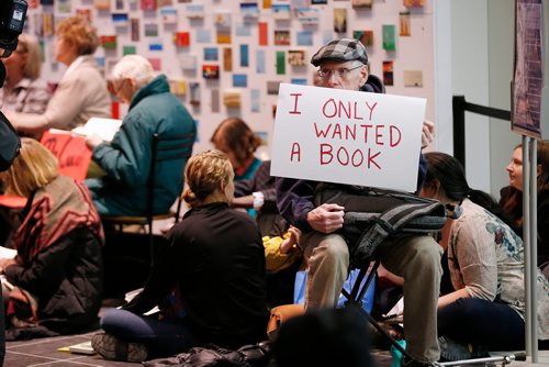 JOHN WOODS / WINNIPEG FREE PRESS
Russ Haggerty takes part in a sit-in protest at Millennium Library in Winnipeg Tuesday, April 2, 2019. About two hundred people gathered to protest the use of security checks to enter the library.