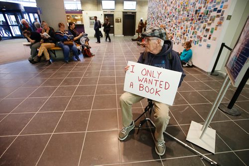 JOHN WOODS / WINNIPEG FREE PRESS
Russ Haggerty takes part in a sit-in protest at Millennium Library in Winnipeg Tuesday, April 2, 2019. About two hundred people gathered to protest the use of security checks to enter the library.