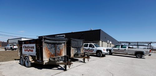 PHIL HOSSACK / WINNIPEG FREE PRESS  - Chateau Roofing and Siding equipment and trucks parked, Office closed. See Martin Cash story. - April 3, 2019.