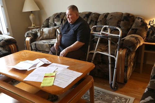 RUTH BONNEVILLE / WINNIPEG FREE PRESS 

Photos of Serge Bouchard, who is blind and uses a wheelchair, in his home at 803 Flora Ave. (with paperwork from the City of Winnipeg on the  coffee table in front of him), in his home on Thursday.  

Serge Bouchard who is blind and uses a wheelchair and is being hounded by city to have work done in his basement even though his 9-year-old house is targeted for demolition because its near Arlington Bridge.


See Carol Sanders story. 



April 4, 2019
