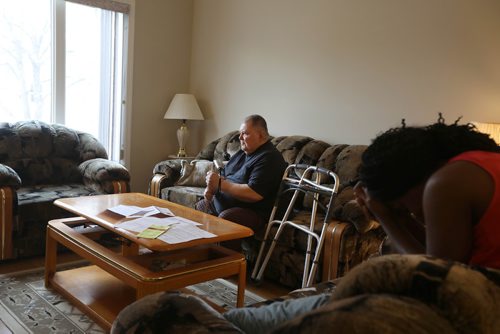 RUTH BONNEVILLE / WINNIPEG FREE PRESS 

Photos of Serge Bouchard, who is blind and uses a wheelchair, in his home at 803 Flora Ave. (with paperwork from the City of Winnipeg on the  coffee table in front of him), in his home on Thursday.  
His wife, Makhady Boucher-Camara, is in photo with him.  

Serge Bouchard who is blind and uses a wheelchair and is being hounded by city to have work done in his basement even though his 9-year-old house is targeted for demolition because its near Arlington Bridge.


See Carol Sanders story. 



April 4, 2019
