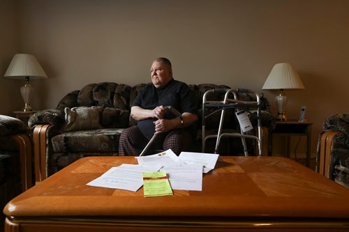 RUTH BONNEVILLE / WINNIPEG FREE PRESS 

Photos of Serge Bouchard, who is blind and uses a wheelchair, in his home at 803 Flora Ave. (with paperwork from the City of Winnipeg on the  coffee table in front of him), in his home on Thursday.  

Serge Bouchard who is blind and uses a wheelchair and is being hounded by city to have work done in his basement even though his 9-year-old house is targeted for demolition because its near Arlington Bridge.


See Carol Sanders story. 



April 4, 2019

