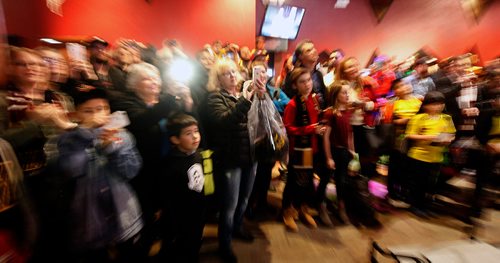 PHIL HOSSACK / WINNIPEG FREE PRESS - Fans crowd the team to photograph the team's unveiling of their 'kit' Thursday. See story.- April 4, 2019.