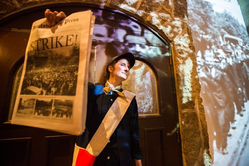 MIKAELA MACKENZIE / WINNIPEG FREE PRESS
Newsie Kaitlin Aiello hawks papers in the 1919 strike gallery at the Manitoba Museum Tribute Gala honouring the Winnipeg Free Press in Winnipeg on Thursday, April 4, 2019.  For Jason Bell story.
Winnipeg Free Press 2019.