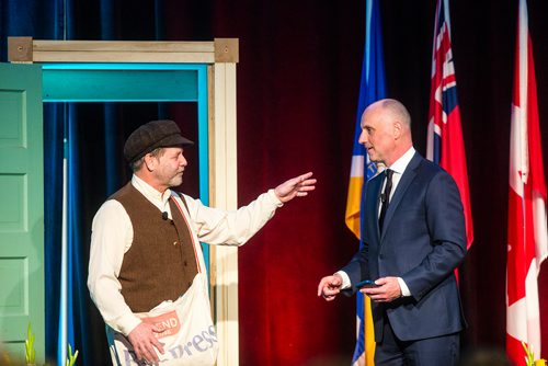 MIKAELA MACKENZIE / WINNIPEG FREE PRESS
News hawker Brian Baird (left) and Free Press editor Paul Samyn act out a skit in support of the Access for All Community Initiative at the Manitoba Museum Tribute Gala honouring the Winnipeg Free Press in Winnipeg on Thursday, April 4, 2019.  For Jason Bell story.
Winnipeg Free Press 2019.