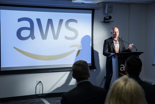 MIKE DEAL / WINNIPEG FREE PRESS
Joshua Burgin, General Manager at Amazon Web Services, speaks during the official opening of the AWS Thinkbox office on the fourth floor of the Johnston Terminal at The Forks, Friday morning.
Amazon Web Services, Inc. an Amazon.com company opened a new office in Winnipeg at The Forks in the Johnston Terminal. The office will be home to AWS Thinkbox, a development team that works on creative solutions for entertainment, design, architecture and engineering industries.
190405 - Friday, April 05, 2019.
