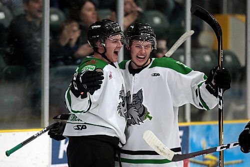PHIL HOSSACK / WINNIPEG FREE PRESS - Portage Terrier #15 Joey Moffatt celebrates with #4 Caelan McPhee after his series opening gaol against the Swan Valley Stampeders in the first period Friday night at Stride Place in Portage la Prairie. See Mike Sawatzsky story. -  April 5, 2019.