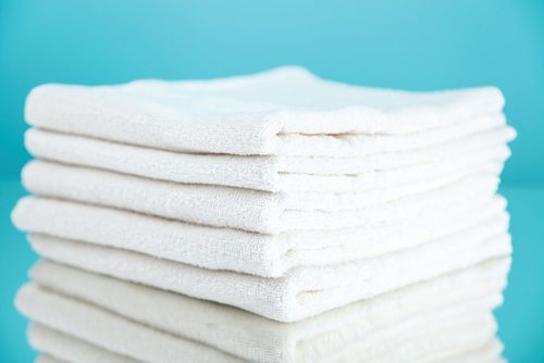 Canstar Community News Pile of clean dry white towels