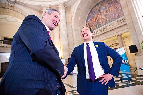 MIKAELA MACKENZIE / WINNIPEG FREE PRESS
Premier Brian Pallister (left) and opposition leader Wab Kinew shake hands during a scrum about a meeting between the two at the Manitoba Legislative Building in Winnipeg on Monday, April 8, 2019.
Winnipeg Free Press 2019.