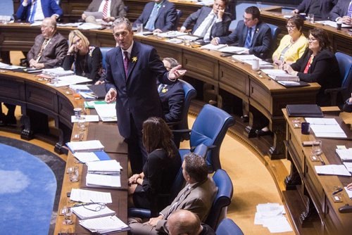 MIKAELA MACKENZIE / WINNIPEG FREE PRESS
Premier Brian Pallister speaks in the chamber with the pages of a report on safe consumption sites thrown on the floor behind him at the Manitoba Legislative Building in Winnipeg on Monday, April 8, 2019.
Winnipeg Free Press 2019.