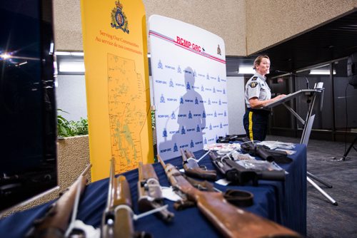 MIKAELA MACKENZIE / WINNIPEG FREE PRESS
Corporal Julie Courchaine speaks to the media about firearms and cash seized in Oakbank at the RCMP D Division Headquarters in Winnipeg on Monday, April 8, 2019.
Winnipeg Free Press 2019.