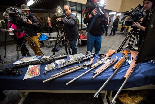 MIKAELA MACKENZIE / WINNIPEG FREE PRESS
Firearms and cash seized in Oakbank on display at the RCMP D Division Headquarters in Winnipeg on Monday, April 8, 2019.
Winnipeg Free Press 2019.