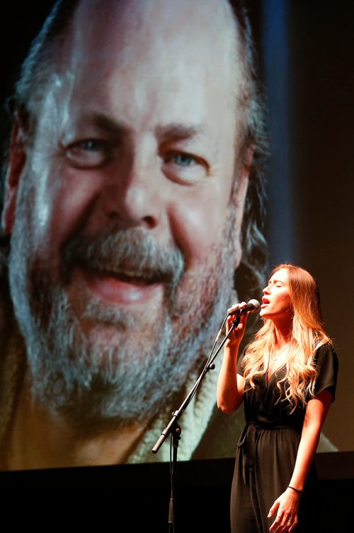 JOHN WOODS / WINNIPEG FREE PRESS
Izzy Dahl sings at the Celebration of Life for Winnipeg Free Press writer Randy Taylor at the Burton Cummings Theatre in Winnipeg Monday, April 8, 2019.

Reporter: Alex