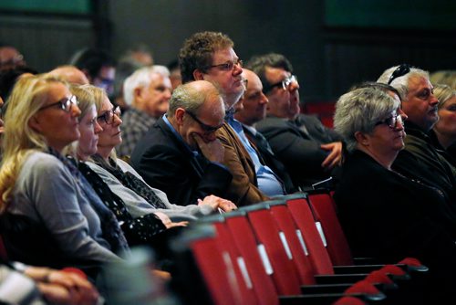 JOHN WOODS / WINNIPEG FREE PRESS
Winnipeg Free Press publisher, Bob Cox, centre, and other staff listen at a Celebration of Life for Winnipeg Free Press writer Randy Taylor at the Burton Cummings Theatre in Winnipeg Monday, April 8, 2019.

Reporter: Alex