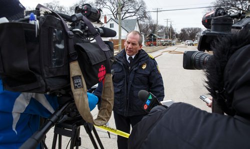 MIKE DEAL / WINNIPEG FREE PRESS
John Lane, Chief of Winnipeg Fire Paramedic Service speaks to the media at the scene of the fatal house fire on Boyd Ave. Tuesday morning.
190409 - Tuesday, April 09, 2019.
