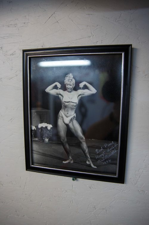 MIKE DEAL / WINNIPEG FREE PRESS
A photo of Susan during her brief foray into bodybuilding in the mid-90's.
Susan Haywood a record-breaking 70-year-old power lifter works out in her home gym near Teulon, Manitoba.
190403 - Wednesday, April 03, 2019.
